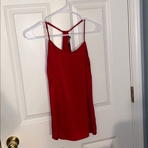 red flowy tank